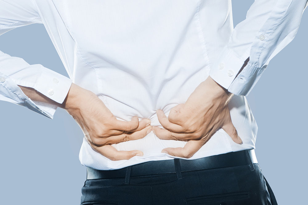 Back pain symptoms, causes, and effective home remedies for quick relief